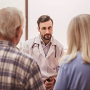 Doctor consulting patients